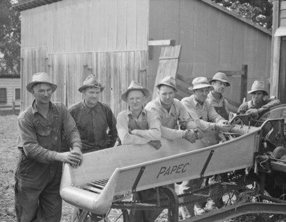 Seven of the eight farmers shown with their coop...West Carlton, Yamhill County, Oregon, 1939. Creator: Dorothea Lange.