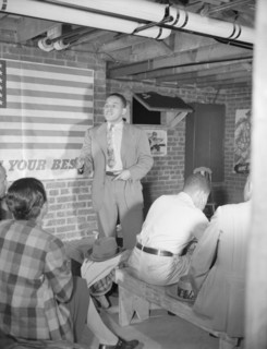 Air raid wardens' meeting in zone nine, Southwest area, Washington, D.C, 1942. Creator: Gordon Parks.