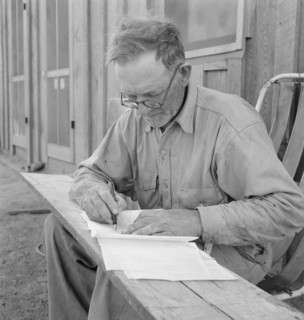 Oklahoma farmer, now living in Cow Hollow, is a FSA borrower, Malheur County, Oregon, 1939. Creator: Dorothea Lange.