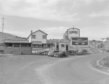 Road which crosses the highway and leads from Coulee city, Grant County, Washington, 1939. Creator: Dorothea Lange.