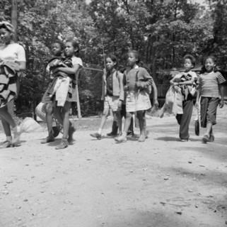 Campers returning from a day's hike at Camp Fern Rock, Bear Mountain, New York, 1943 Creator: Gordon Parks.