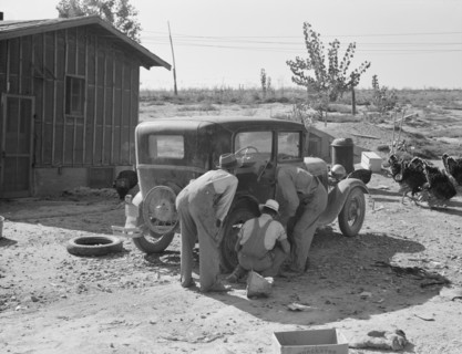Stephens brothers, who own combine cooperatively..., Nyssa Heights district, Oregon, 1939. Creator: Dorothea Lange.