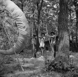 Practicing on the archery range at Camp Fern Rock, Bear Mountain, New York, 1943 Creator: Gordon Parks.