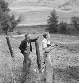 Farmer and boy in the fall of the year at the time the hunting..., Jackson County, Oregon, 1939. Creator: Dorothea Lange.