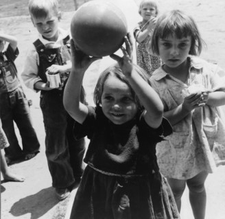 Nursery school, showing migrant children playing, FSA camp, Tulare County, 1939. Creator: Dorothea Lange.