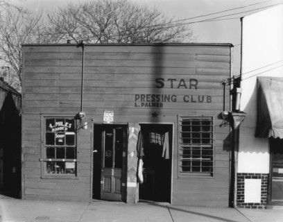 Negro shop, Shop fronts, laundry and barber shop, Vicksburg, Mississippi, 1936. Creator: Walker Evans.