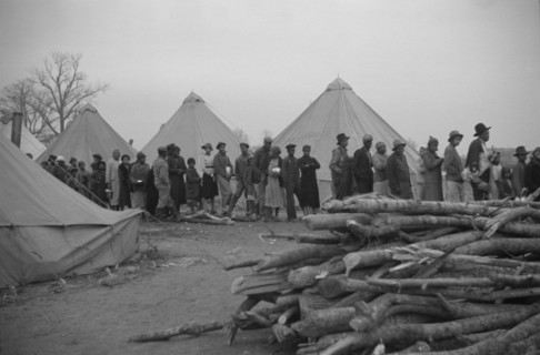 Possibly: Negroes in the lineup for food at meal time in the camp..., Forrest City, Arkansas, 1937. Creator: Walker Evans.