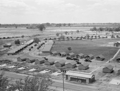 Three units of the camp, each with its sanitary..., Farmersville, Tulare County, CA, 1939. Creator: Dorothea Lange.