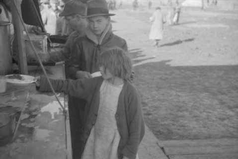 Possibly: Negroes in the lineup for food at mealtime in the camp..., Forrest City, Arkansas, 1937. Creator: Walker Evans.