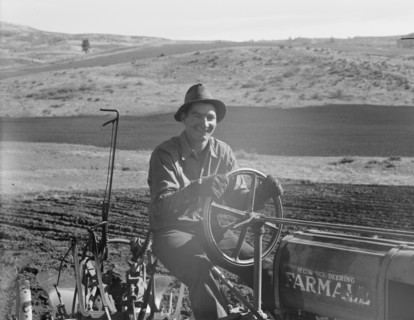 Young farmer, member of Ola self-help sawmill co-op, plowing..., Gem County, Idaho, 1939. Creator: Dorothea Lange.