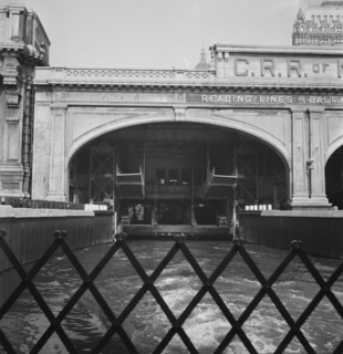 Ferry slip seen from ferry which transports passengers across the Hudson..., New York City, 1939. Creator: Dorothea Lange.