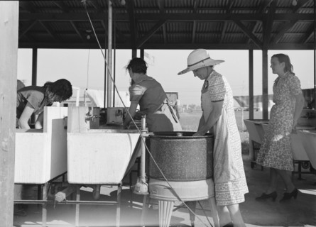 Laundry facilities in FSA migrant labor camp, Westley, California, 1939. Creator: Dorothea Lange.