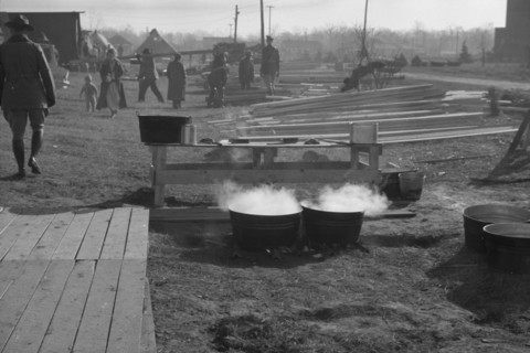 Possibly: The kitchen in the camp for white flood refugees at Forrest City, Arkansas, 1937. Creator: Walker Evans.