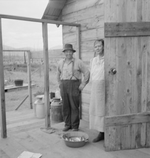New settler shows fish he caught..., Priest River Valley, Bonner County, Idaho, 1939. Creator: Dorothea Lange.