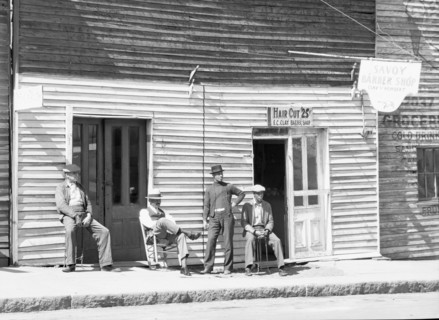 Vicksburg Negroes and shop front, Mississippi, 1936. Creator: Walker Evans.