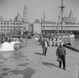Possibly: Barrels of fish on the docks at Fulton fish market ready to be shipped..., New York, 1943. Creator: Gordon Parks.