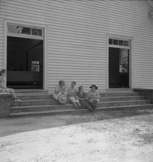 Conversation among members of congregation, Wheeley's Church, Gordonton, N Carolina, 1939. Creator: Dorothea Lange.