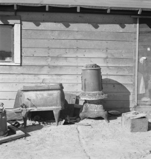 Stoves outside the Browning house being repaired for winter use, Dead Ox Flat, Oregon, 1939. Creator: Dorothea Lange.