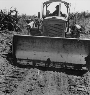 Bulldozer equipped with grader..., Nieman farm, near Vader, Lewis County, Western Washington, 1939. Creator: Dorothea Lange.