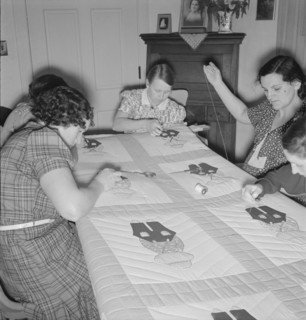 Farm women working on quilt, near West Carlton, Yamhill County, Oregon, 1939. Creator: Dorothea Lange.