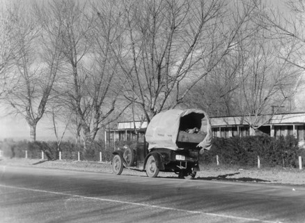 Texans earning their way westward, bound for a new start in Oregon, US 99, California, 1935. Creator: Dorothea Lange.