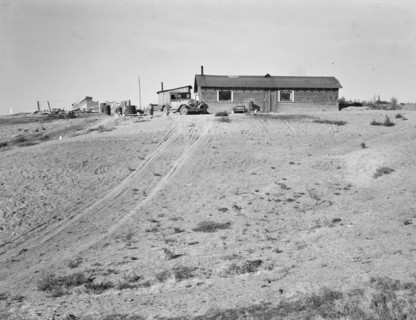 The Browning home, a partial dugout, Dead Ox Flat, Malheur County, Oregon, 1939. Creator: Dorothea Lange.