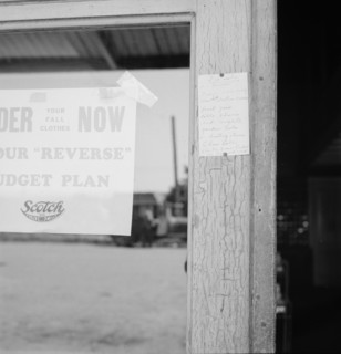 Sign on post office door: Farm animals and household equipment for sale. Vader, western Washington.