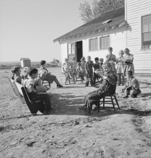 Entire enrollment of Lincoln Bench School. Teacher in center. Near Ontario, Oregon, Malheur County.