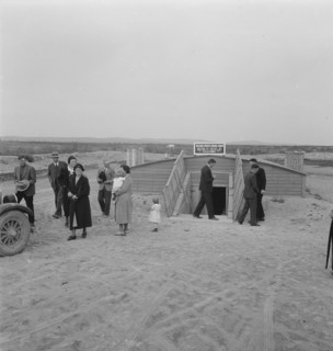 Congregation leaving after services. Preacher in doorway. Dead Ox Flat, Malheur County, Oregon.