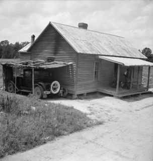 Home of Negro tobacco tenant with addition of improvised garage. Wake County, North Carolina.