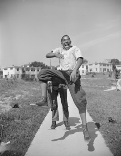 Anacostia, D.C. Frederick Douglass housing project. Boys playing leap frog near the project.