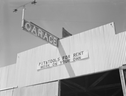 U.S. 99. Fresno County. "Pit and tools for rent--work on your own." California. ['Garage'].