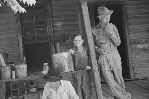 Bud Fields, Tengle boy, and Floyd Burroughs on Frank Tengle's porch, Hale County, Alabama.