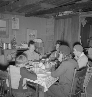 The Wardlow family in their dugout basement home. Dead Ox Flat, Malheur County, Oregon.