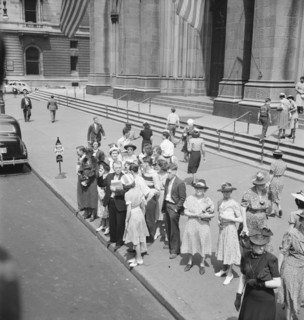 Fifth Avenue at Saint Patrick's Cathedral. Waiting for an uptown bus. New York City.