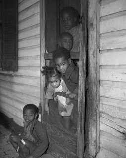 Washington (southwest section), D.C. Negro children in the front door of their home.