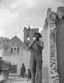 Washington, D.C. Construction workman wrecking a church on Independence Avenue.