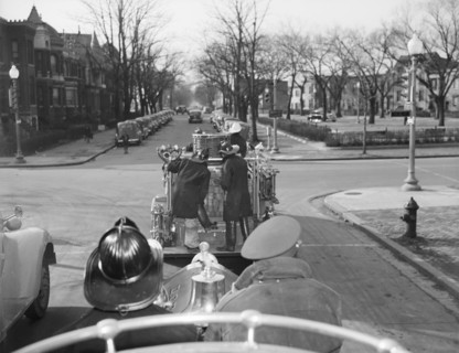 Firehouse station number four. Washington, D.C. Engines returning from a fire.