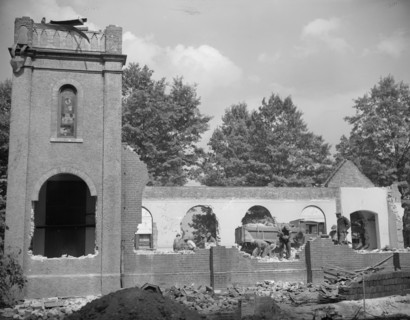 Washington, D.C. Laborers wrecking houses on Independence Avenue.