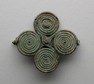 Quatrefoil spiral fibula (garment pin), 7th century BCE.
