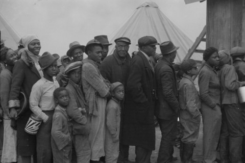 Flood refugees at mealtime, Forrest City, Arkansas.
