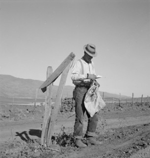 Farmer getting the morning mail. Gem County, Idaho.
