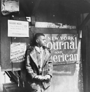 New York, New York. Harlem newsboy.