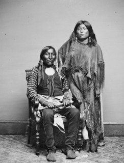 Lone Wolf and his wife Etla, Kiowa Indians, between 1855 and 1865. Creator: Unknown.