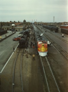 Santa Fe R.R. streamliner, the "Super Chief," being serviced..., Albuquerque, N.Mexico, 1943. Creator: Jack Delano.