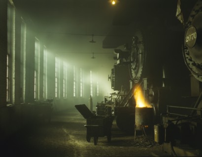 In the roundhouse at a Chicago and North Western Railroad yard, Chicago, Ill., 1942. Creator: Jack Delano.