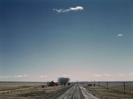 Passing a section house along the Atchison, Topeka, and Santa Fe railroad, New Mexico, 1943. Creator: Jack Delano.