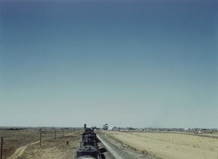 Westbound freight train stopping for water, Melrose, New Mexico, 1943. Creator: Jack Delano.