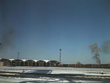 Train pulling out of the freight house at C & NW RR's Proviso Yard, Chicago, Ill., 1942. Creator: Jack Delano.
