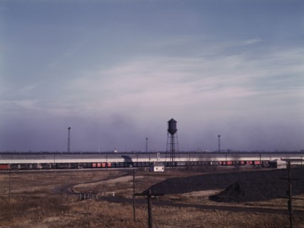 Truck trailers loading and unloading at C & NW RR's Proviso yard, Chicago, Ill., 1942. Creator: Jack Delano.